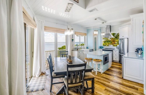 Cutthroat Harbor Estates House | Amazing waterfront home with private beach, dock, pool, WiFi & outdoor kitchen