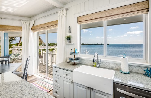 Cutthroat Harbor Estates House | Amazing waterfront home with private beach, dock, pool, WiFi & outdoor kitchen