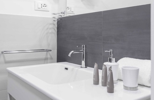 Quartiere XXI Pietralata Apartment | Amoretti Apartment, 6 people, 3 bedrooms, 2 bathrooms, Wi-Fi, Metro B Monti Tiburtini