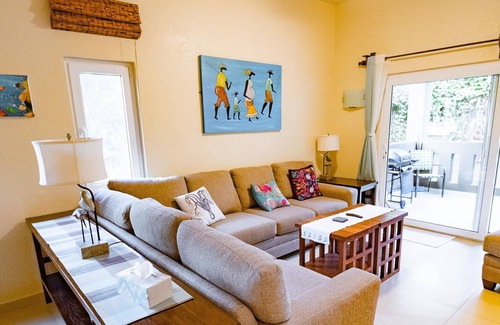 Antoneys Cay Condo | An Oasis in West End: Waterfront with Pool and Dock
