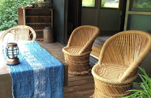 Matsusaka House | An old house with a spacious kitchen surrounded by mountains and clear streams