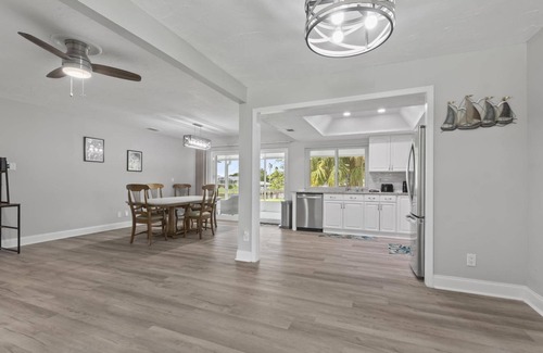 Palm Harbor House | Anchors Landing Waterfront Home | Dock | Foosball | Fire Pit | Close To The Beach | Dog Friendly