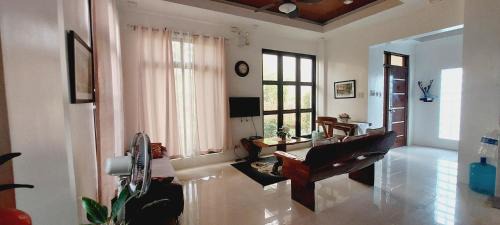 Puerto Princesa City Centre House | Andrew n Sophia's Guest House