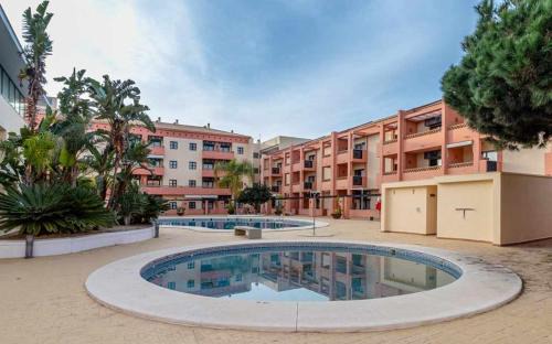 Punta Umbria Apartment | Apartamento junto a la playa con piscina y parking