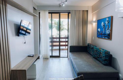 Porto das Dunas Hotel | Apartamento no Suítes Resort - Pé na areia - Ao lado do parque aquático - Administrado por Anfitrião
