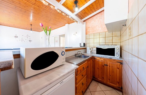 Roda Apartment | Apartment 'Alexandros Two Bedroom 2' with Shared Pool, Wi-Fi and Air Conditioning