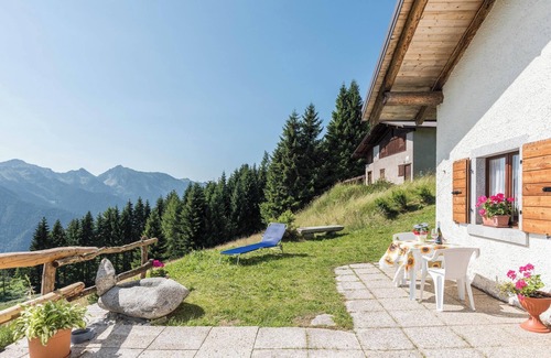 Sella Giudicarie Apartment | Apartment "Baita Località Cap" with Garden & Mountain View