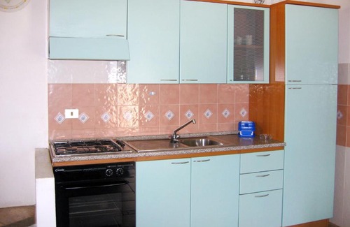 Tanaunella Apartment | Apartment Borgo Le Logge trilo - BUD112 by Interhome