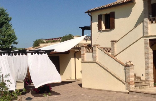 Cingoli Villa | Apartment by Lake with Garden Views