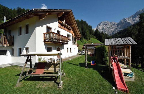 La Valle Apartment | Apartment "Ciasa Mirio Armentara" with Mountain View, Wi-Fi & Garden