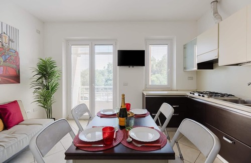 Torre Grande Apartment | Apartment 'La Baia Del Sole' with Shared Pool, Wi-Fi and Air Conditioning