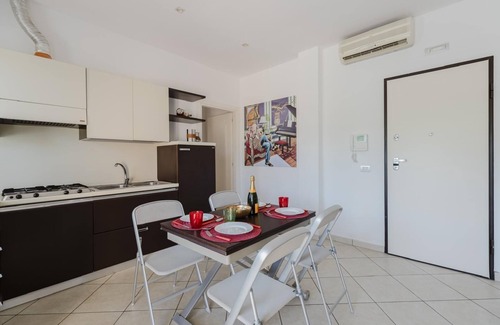 Torre Grande Apartment | Apartment 'La Baia Del Sole' with Shared Pool, Wi-Fi and Air Conditioning