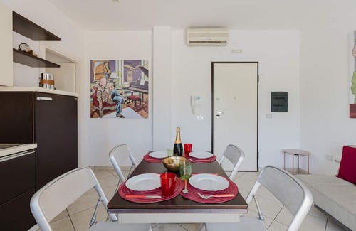 Torre Grande Apartment | Apartment 'La Baia Del Sole' with Shared Pool, Wi-Fi and Air Conditioning
