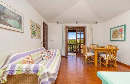 Baja Sardinia Apartment | Apartment "Mucchi Bianchi LC-103" With Sea View, WiFi, Balcony and Garden; Pet friendly