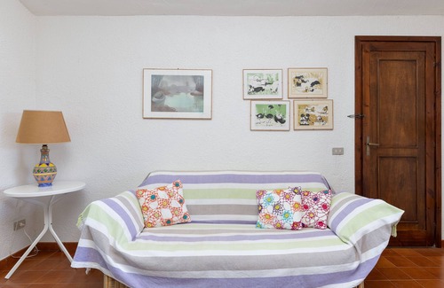 Baja Sardinia Apartment | Apartment "Mucchi Bianchi LC-103" With Sea View, WiFi, Balcony and Garden; Pet friendly