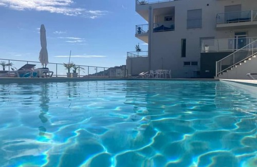 Nazare Apartment | Apartment 'Nazaré Dream View' with Sea View, Shared Pool and Wi-Fi