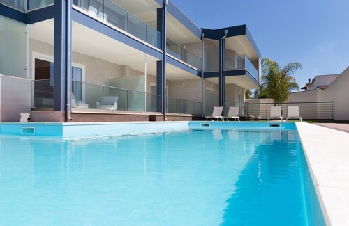 Villa San Pietro Apartment | Apartment "Residence Meridian Unità 7" Near the Beach with Mountain View, Pool, A/C, Wi-Fi & Balcony
