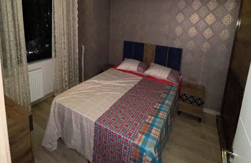 Esenyurt House | Apartment room and salon within a block with a pool and gym
