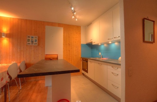 Anzere Apartment | Apartment with 1 bedroom with 2 single beds, 1 bedroom with a double bed, 2 bathrooms with bath and