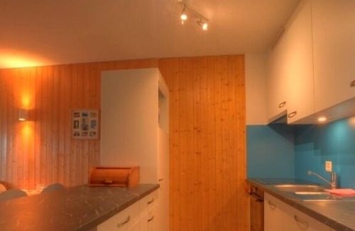 Anzere Apartment | Apartment with 1 bedroom with 2 single beds, 1 bedroom with a double bed, 2 bathrooms with bath and