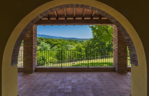 Laterina Apartment | Apartment with stunning views of the medieval town of Laterina, swimming pool ,wi-fi, and on-site re