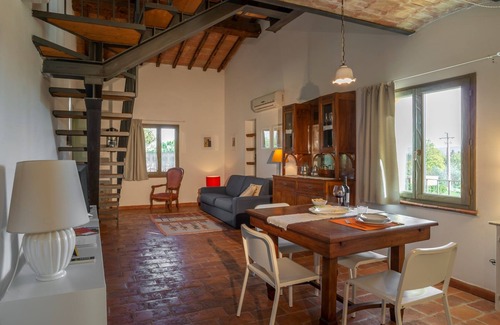 Laterina Apartment | Apartment with stunning views of the medieval town of Laterina, swimming pool ,wi-fi, and on-site re