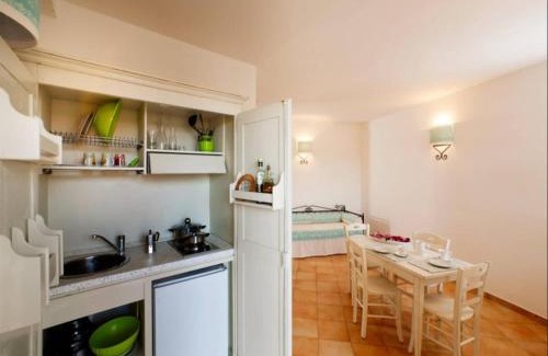 Vignola Mare House | Apartments with shared pool Vignola Mare Aglientu