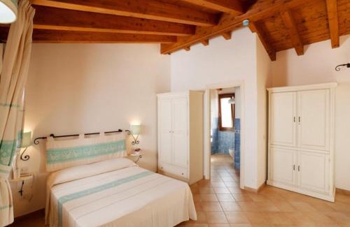 Vignola Mare House | Apartments with shared pool Vignola Mare Aglientu