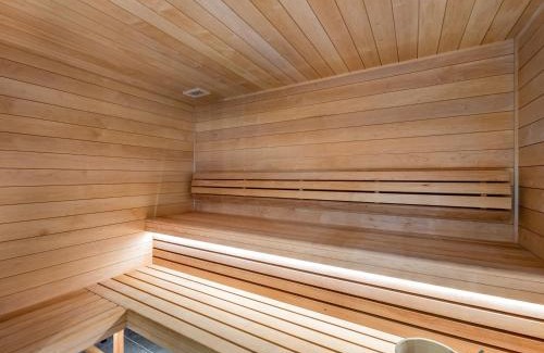 Le Planellet Apartment | Appartement neuf avec terrasse, 2 chambres près des pistes, sauna, hammam, salle de sport, parking - FR-1-569-57