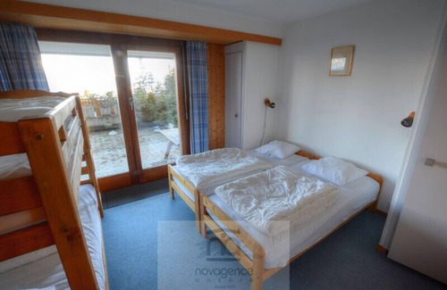 Anzere Apartment | Appartment with a terrace, entrance corridor, 1 bedroom with 2 single beds and 1 bunk bed, 1 bathroo