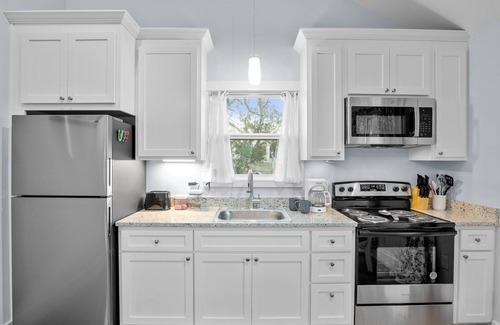 Fredericksburg Cabin | Appian Way Maltese Cottage 1 Bedroom Cabin by RedAwning