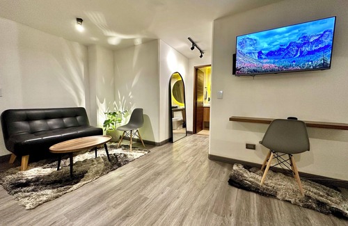 Calle 100 Apartment | Apt with private jacuzzi sauna sauna fireplace cinema and gym king size bed 93 park