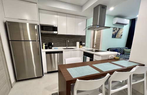 Tuscany Residence Aruba Apartment | Aracari Unit-7 next to pool