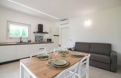 Borgo Milano Apartment | Armonia Suites -Earth and Water new apartments with garden and pool in Verona