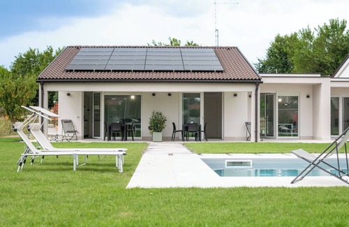 Borgo Milano Apartment | Armonia Suites Terra, new apartment with garden and pool in Verona
