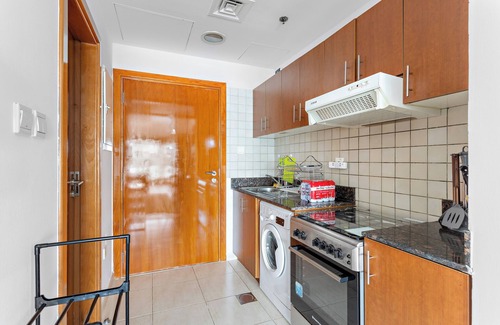 Dubai Apartment | Art Deco Studio with a Pool, Gym, Children's Playground