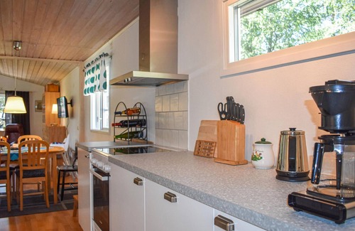Yngsjo House | At this cottage you have a wood-burning stove in the living room and on the terrace an open fireplac