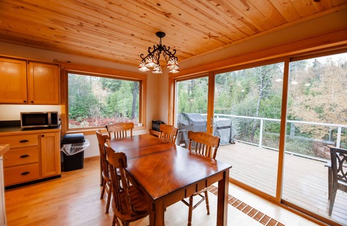 Champion House | ATV-Snowmobile Trail, Large home, sits on the peshekee river. sleeps 18 people.