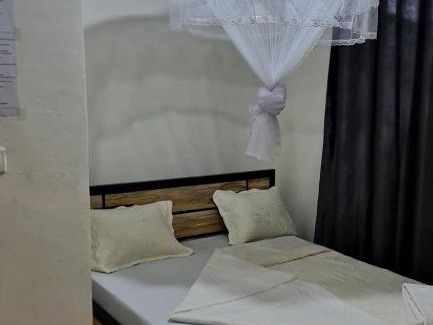 Kigali House | AUBERGE DE NYAMIRAMBO