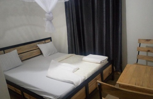 Kigali House | AUBERGE DE NYAMIRAMBO