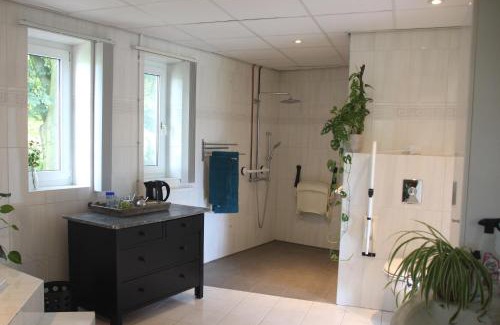 Heukelom Bed & Breakfast | B&B Even Heukelom - Kamer met Tuin