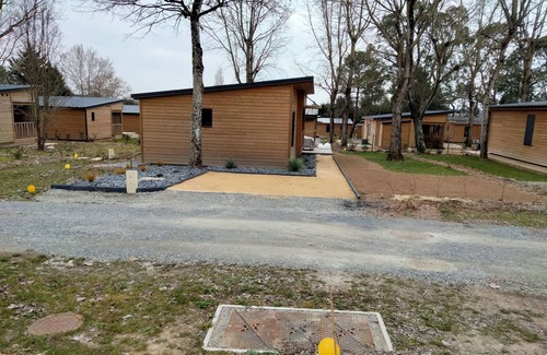 Guerande Ski Chalet | B032 3-bedroom wooden chalet on secure estate with covered swimming pool.