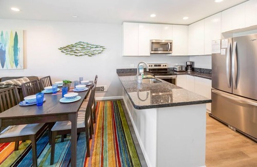 Townsite Condo | B306 - Luxury Penthouse with spacious deck. Enjoy ocean View from Deck lounge sun bed