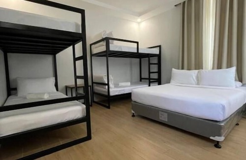 Puerto Princesa City Centre Hotel | Bambu Suites