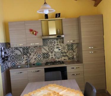 Basico House | Basicò un balcone sul mare-Casa I CARRUGGI- Case vacanza Sicilia&Toscana-