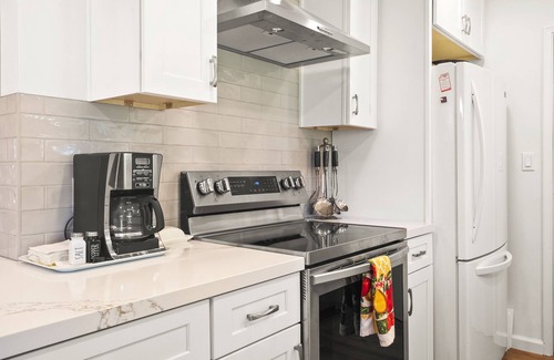 Bay Park House | Bay Park Garden Dream - Central Location, AC, Washer/Dryer & Private Yard!