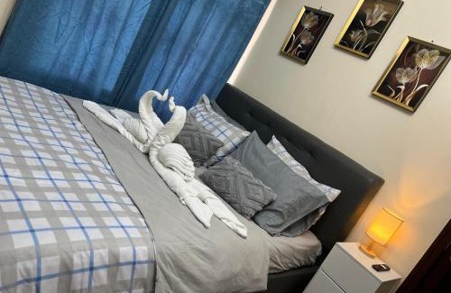 Pasay Apartment | Bayfront Suite in Pasay, Manila Near NAIA Terminal, PICC, Star City, MOA and US Embassy - Pet-Friendly, Free Pool, Wi-Fi & Netflix