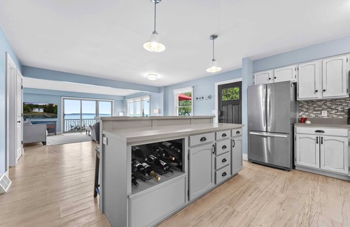 Suttons Bay House | Bayside Serenity with Hot Tub! Dog Friendly!
