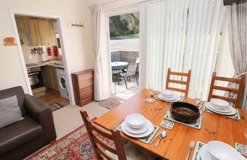 Oxwich House | BAYVIEW BUNGALOW, pet friendly, with a garden in Reynoldston