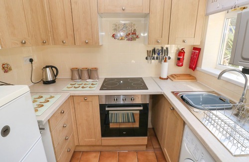 Oxwich House | BAYVIEW BUNGALOW, pet friendly, with a garden in Reynoldston